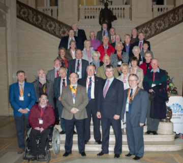 District Governor Jack Cunningham signs the visitors book