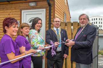 The official cutting of the ribbon