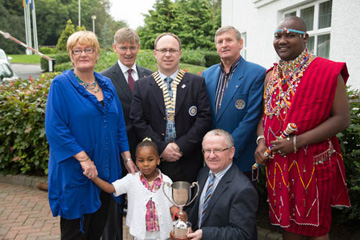 Elaine Bannon along with Ciara Sainapei, Joseph Nkanoni and some Rotarians